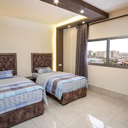 Al Riyati Hotel Apartments อคาบา ภายนอก รูปภาพ